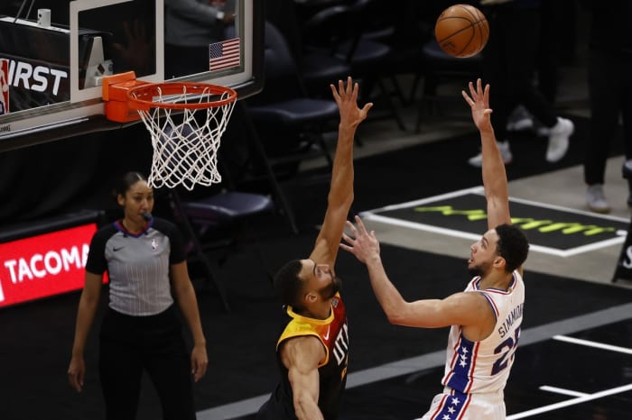 Rudy Gobert (27) attempts to block Ben Simmons (25)